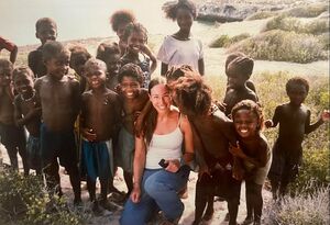 Rinat with children during a conservation project
